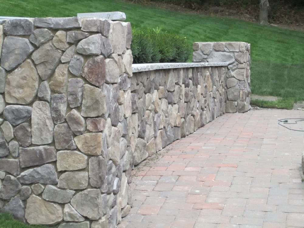 McLeod Landscaping The Beauty of Stone Walls: Features That Stand Out